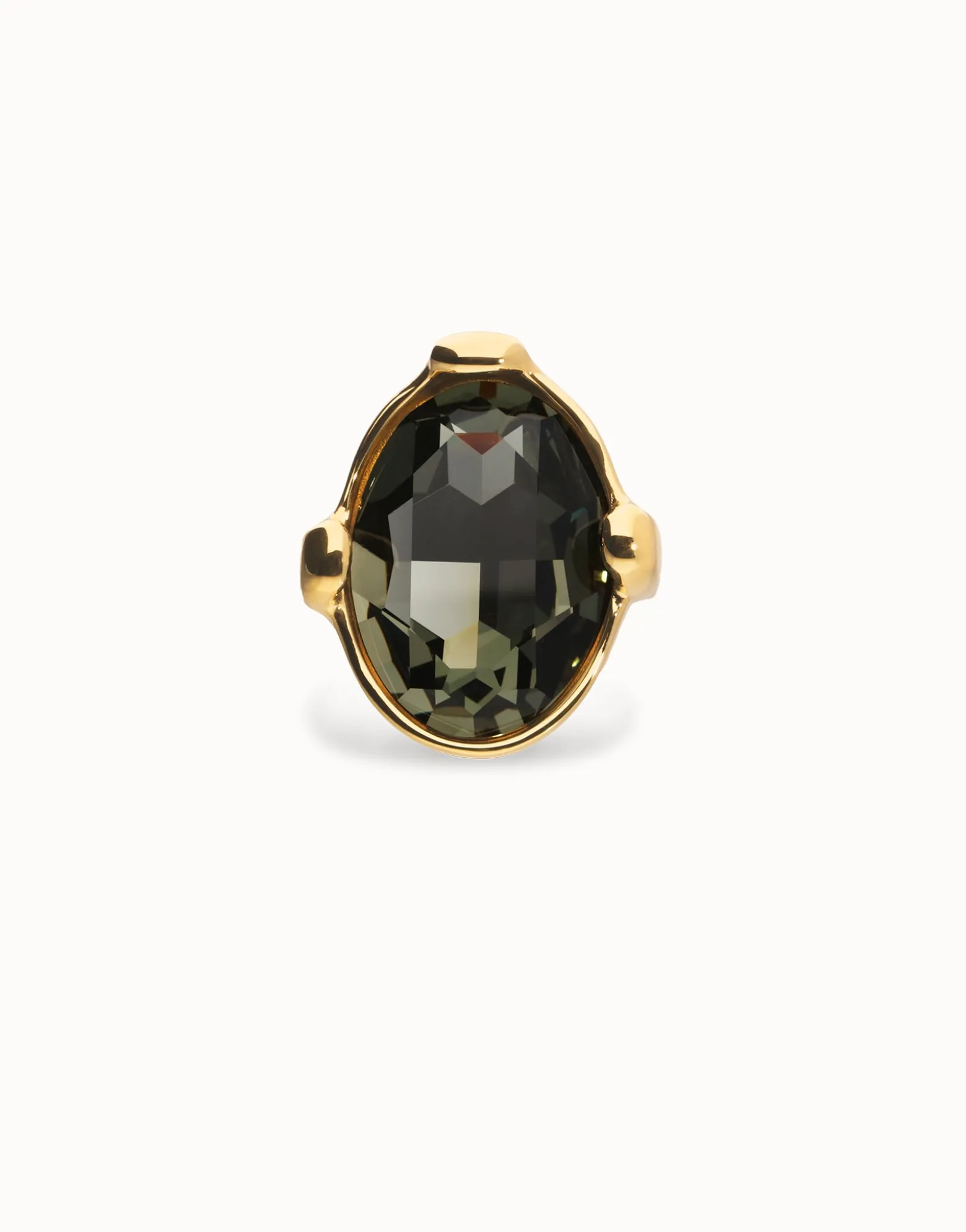 Anillo grande bañado en oro 18k con cristal facetado ovalado gris