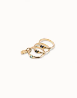 Anillo triple bañado en oro de 18k con cristales azules
