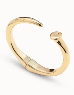 Brazalete con forma de clavo bañado en oro de 18k