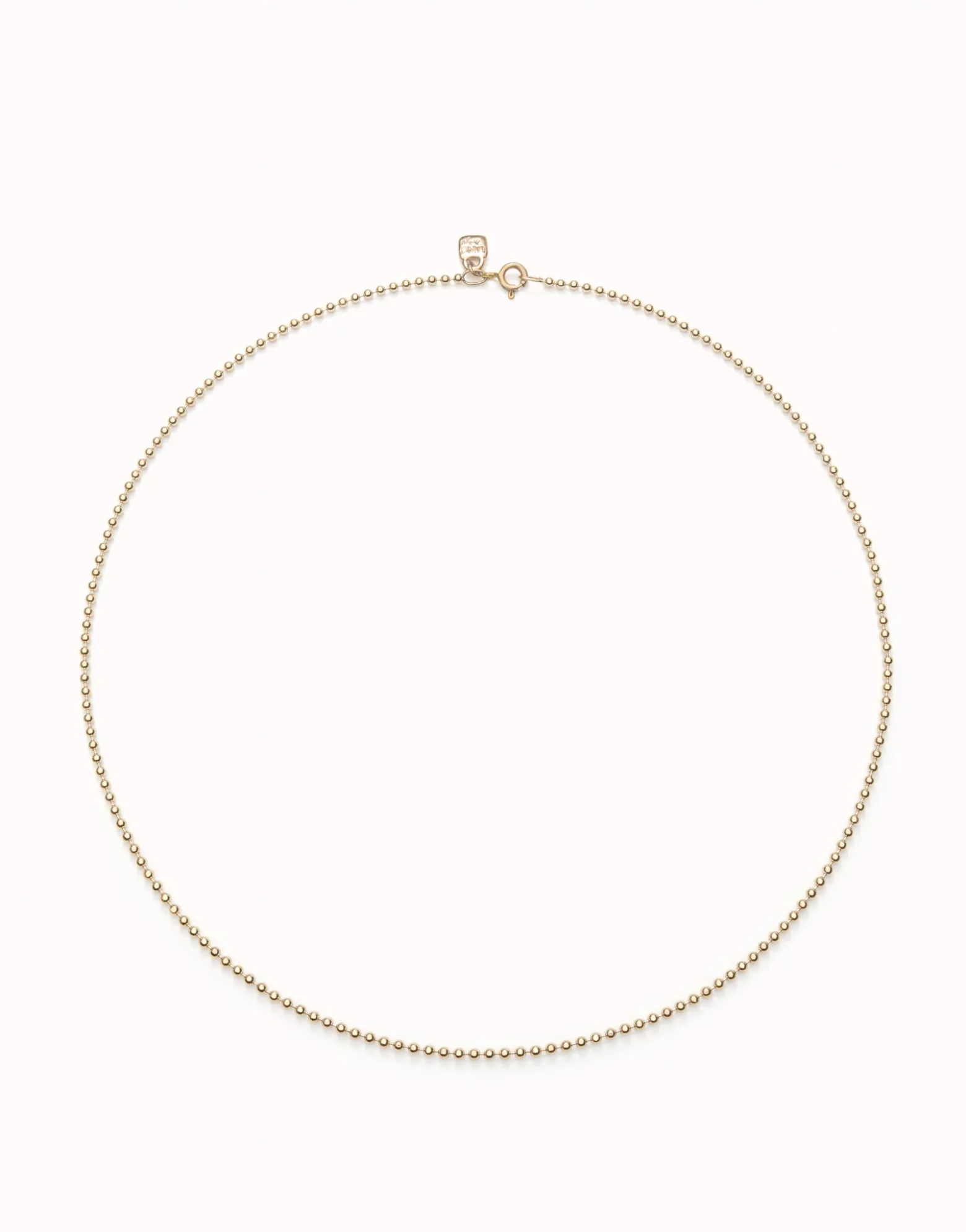Cadena media con bolas bañada en oro 18k