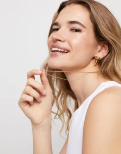 Cadena media con bolas bañada en oro 18k