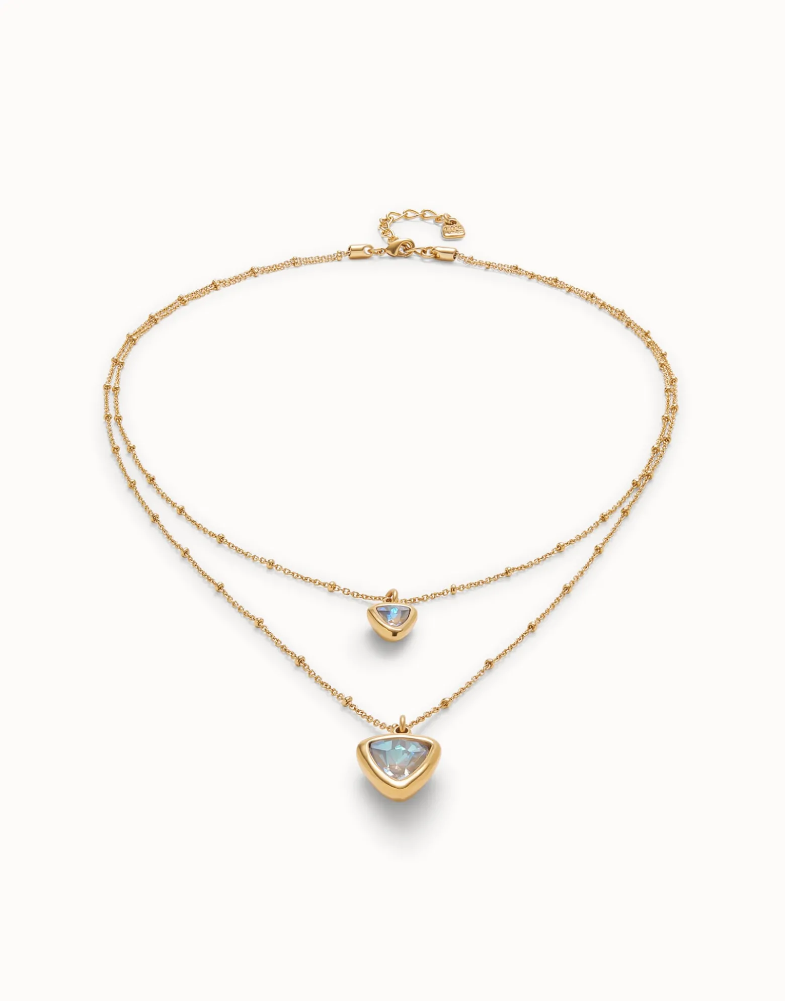 Colgante bañado en oro 18k con doble cadena y triángulo de cristal