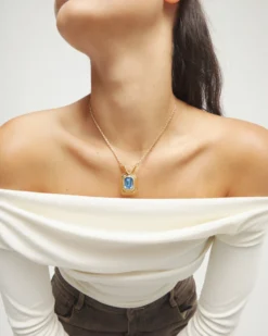 Collar bañado en oro 18k con cristal facetado rectangular azul