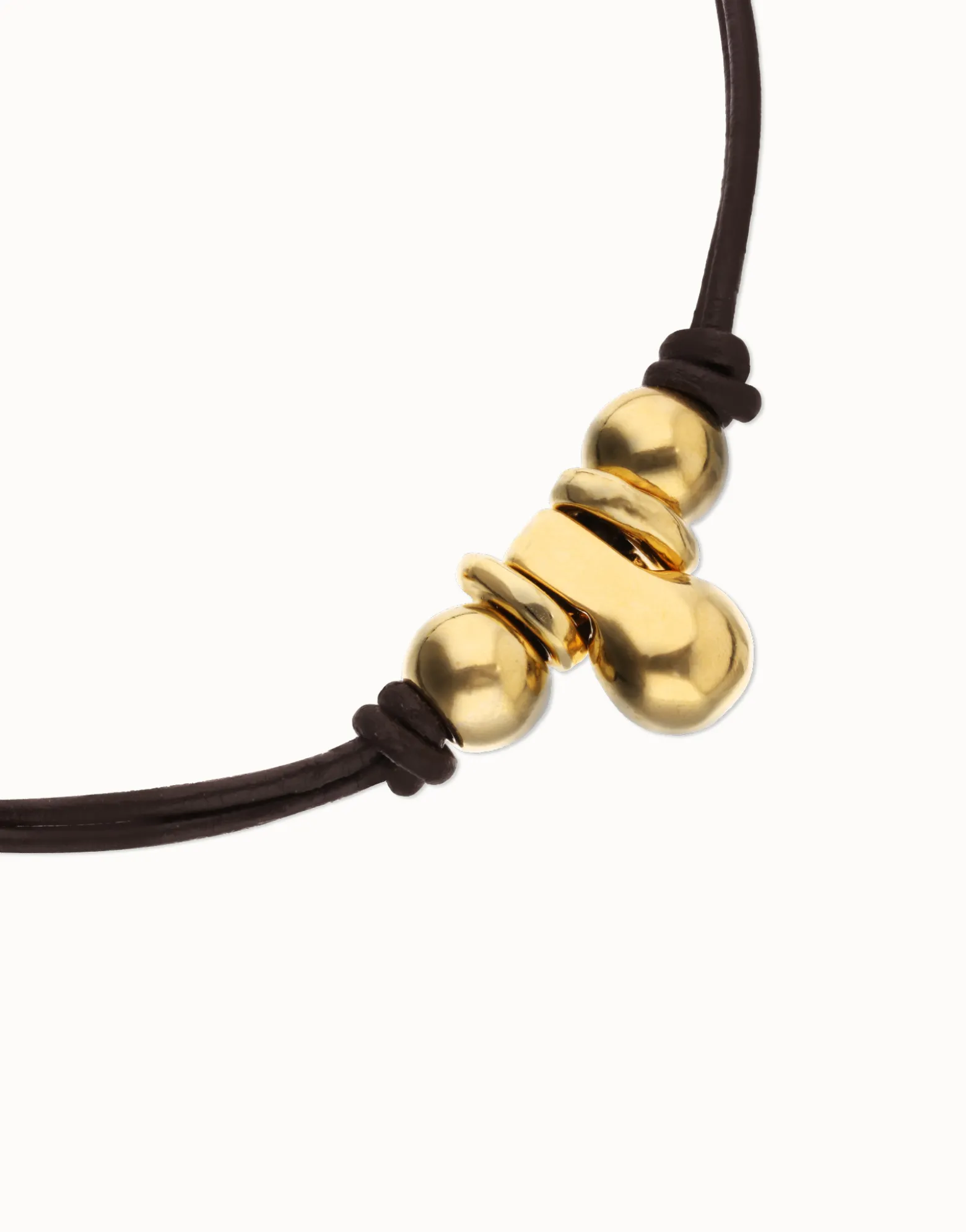Collar de cuero con tres esferas bañadas en oro 18k