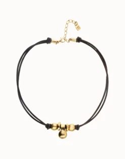 Collar de cuero con tres esferas bañadas en oro 18k