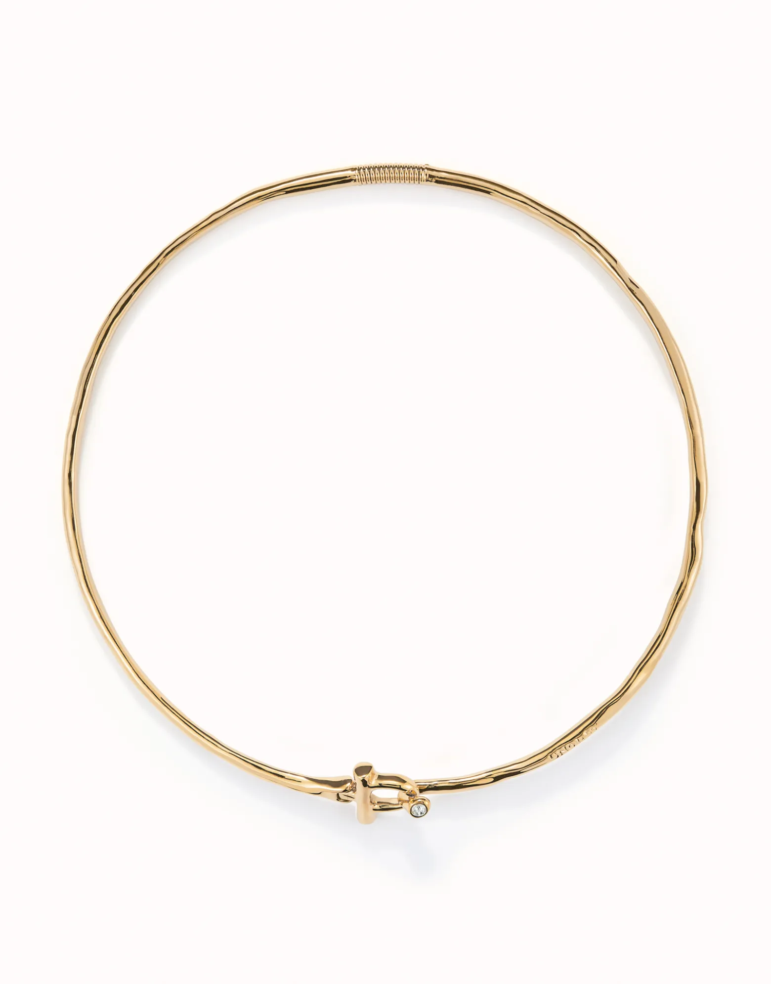 Collar rígido con cierre frontal bañado en oro 18k con topacio blanco