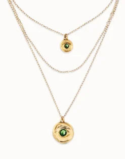 Collar triple bañado en oro 18k con charms de ojo y cristal facetado verde