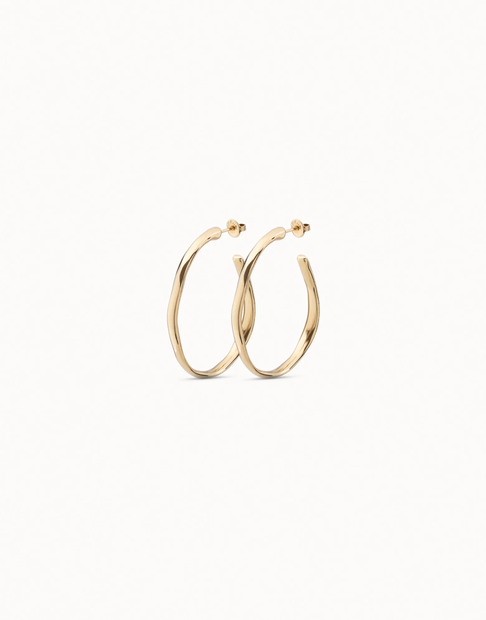 Pendientes de aro abierto bañados en oro de 18k