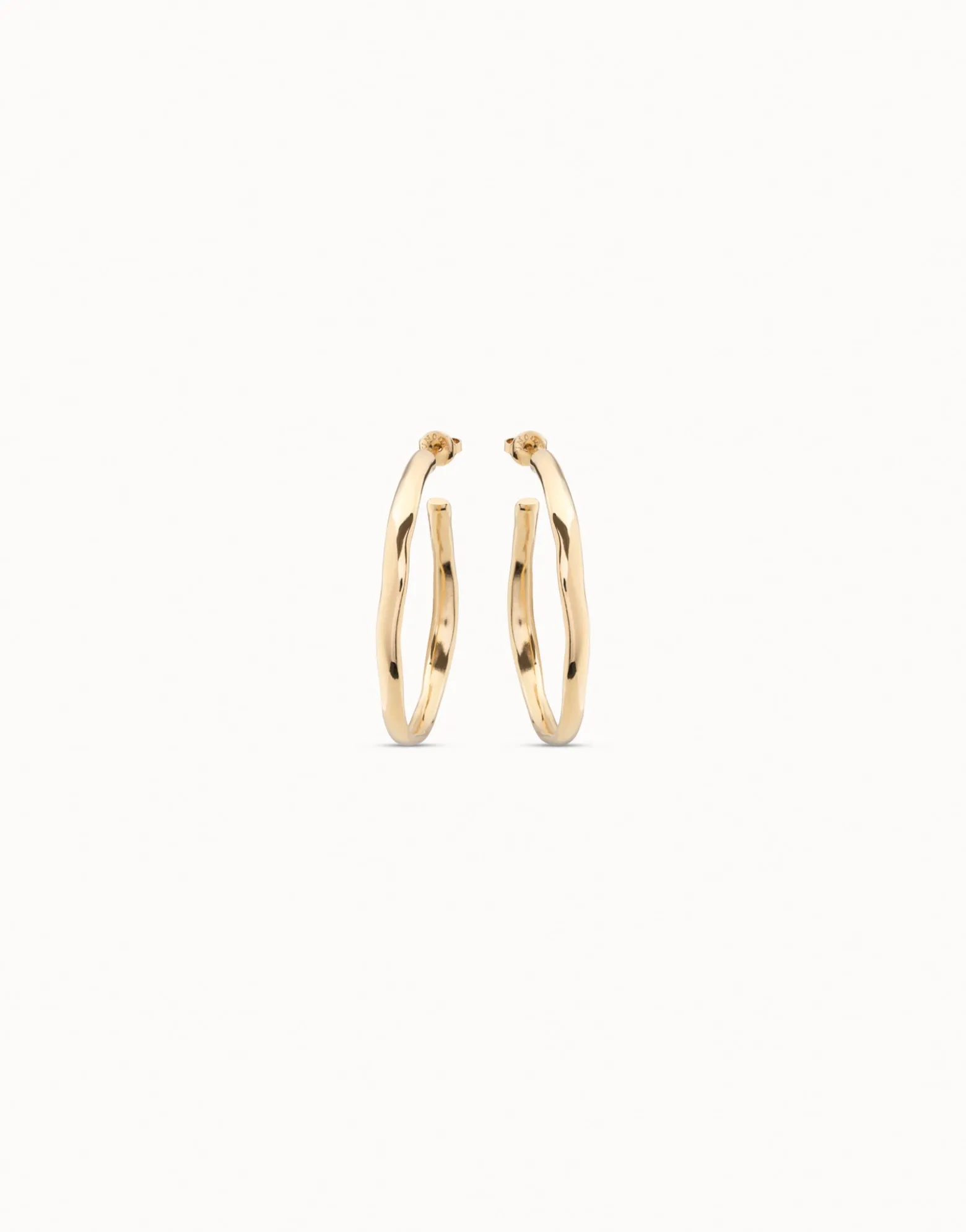 Pendientes de aro abierto bañados en oro de 18k