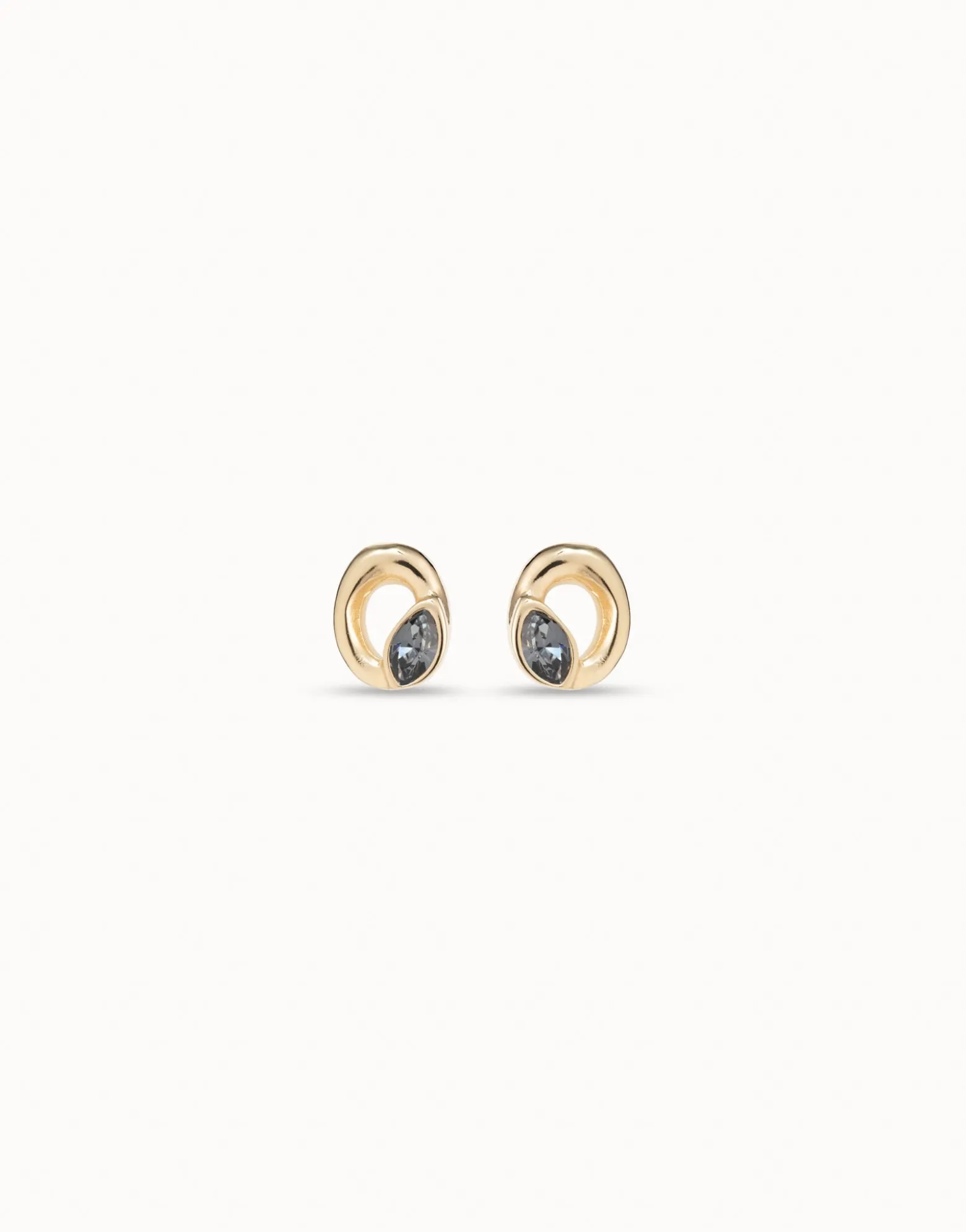 Pendientes stud de oro con forma de óvalo y cristal color gris claro
