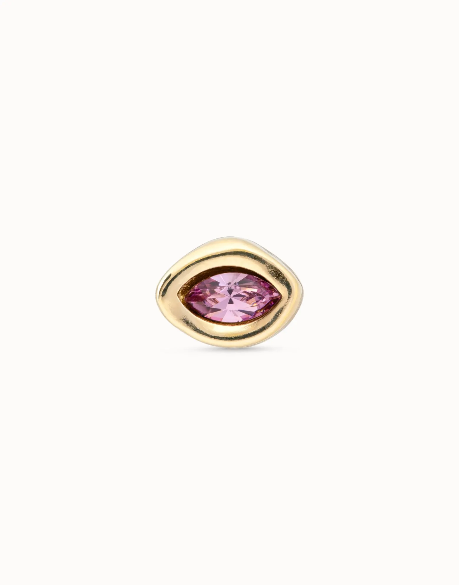 Piercing bañado en oro de 18k y un cristal morado
