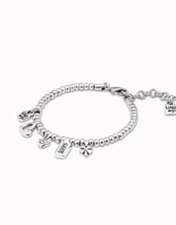 Pulsera bañada en plata de ley con charm corazón, trébol y mano