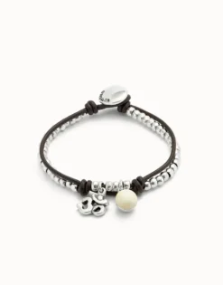 Pulsera bañadas en plata de ley con cuero y cristal de murano marfil
