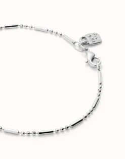 Pulsera con bolas y piezas alargadas bañada en plata de ley