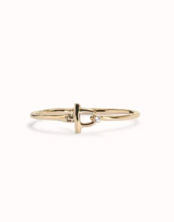 Pulsera con cierre frontal bañada en oro 18k con topacio blanco