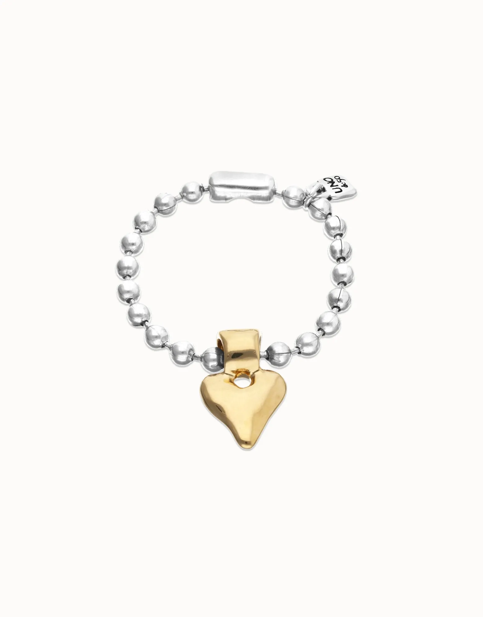 Pulsera de bolas bañada en oro 18k con detalle de corazón