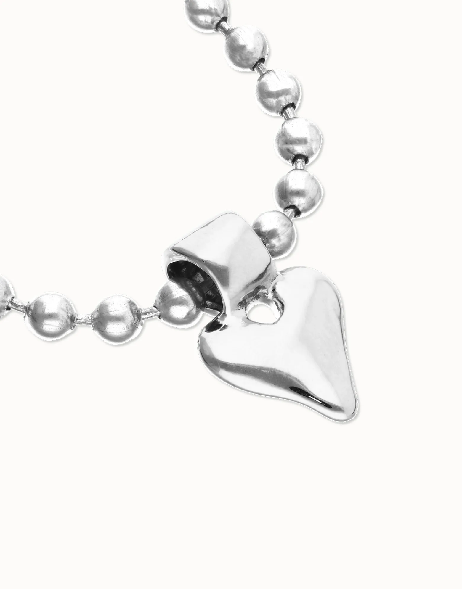 Pulsera de bolas bañada en plata de ley con detalle de corazón