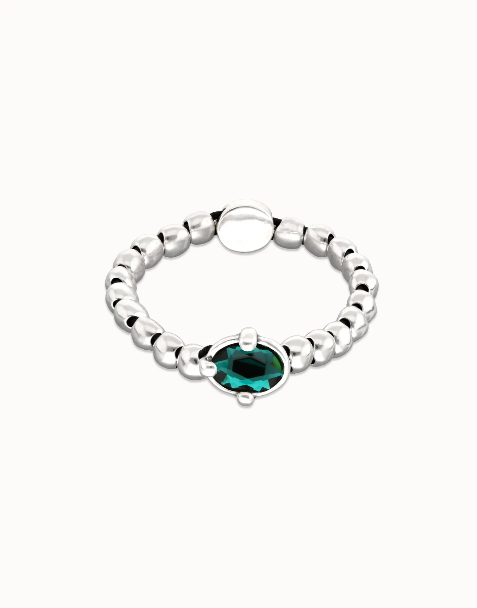 Pulsera de bolas bañada en plata con cristal facetado ovalado verde
