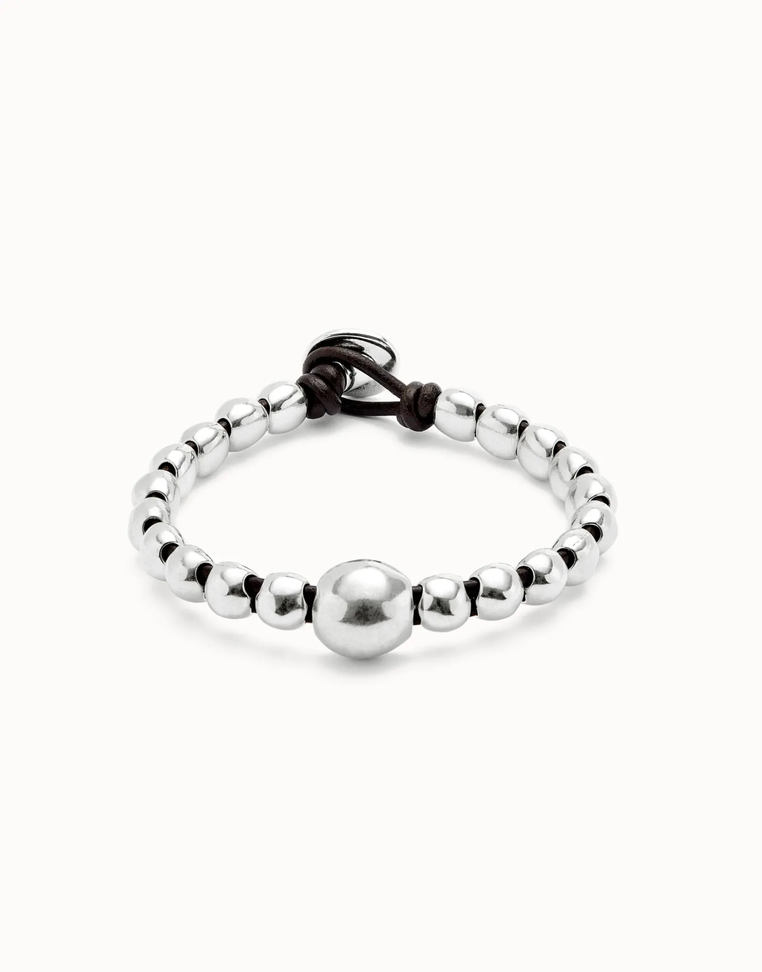 Pulsera de bolas bañadas en plata de ley y bola central de mayor tamaño