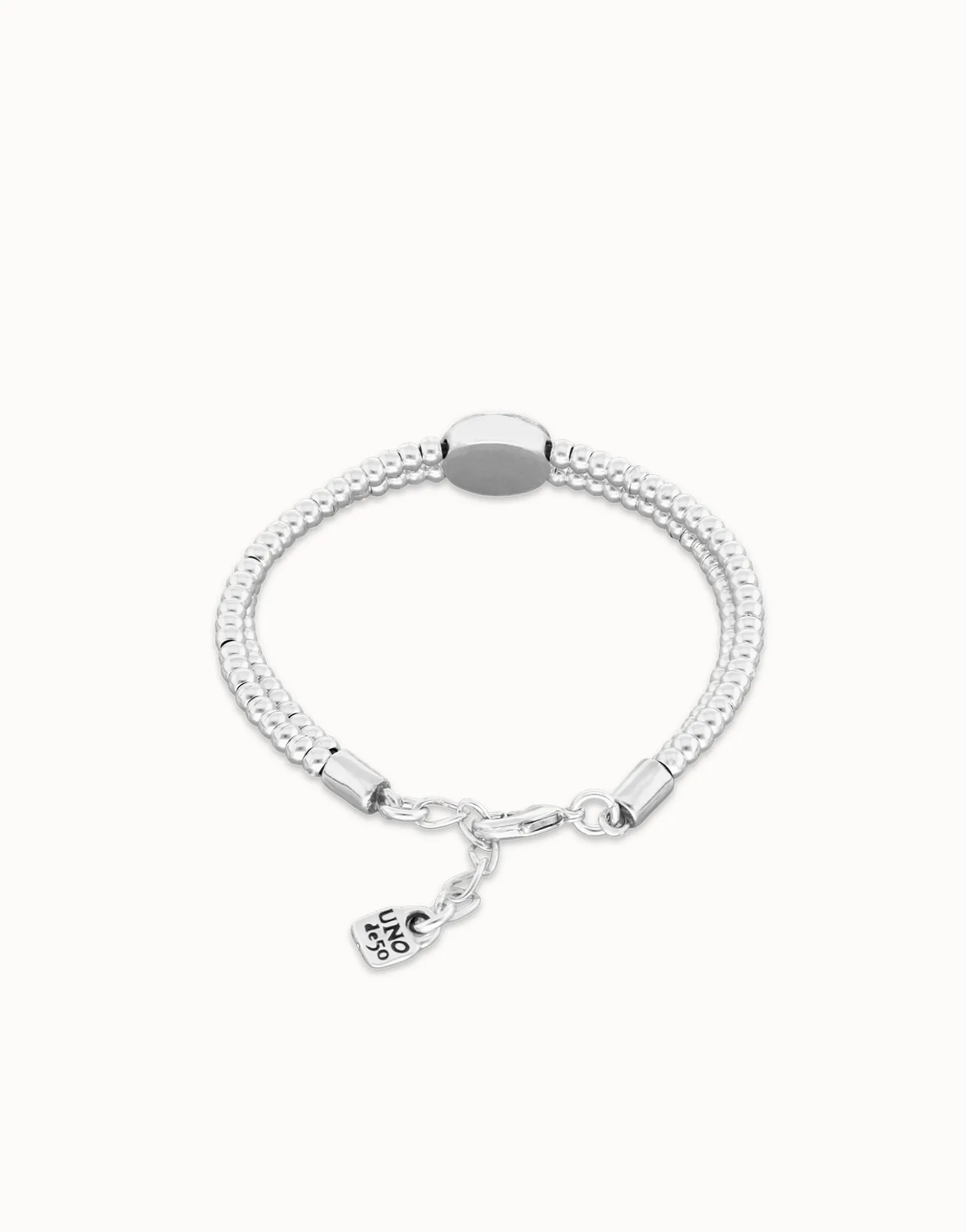 Pulsera de bolas doble bañada en plata de ley con detalle de ojo y cristal azul