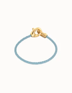 Pulsera de cuero azul con mosquetón entrelazado en oro