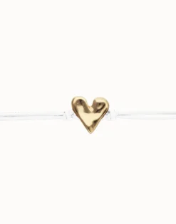 Pulsera de cuero blanco con detalle de corazón bañado en oro 18k