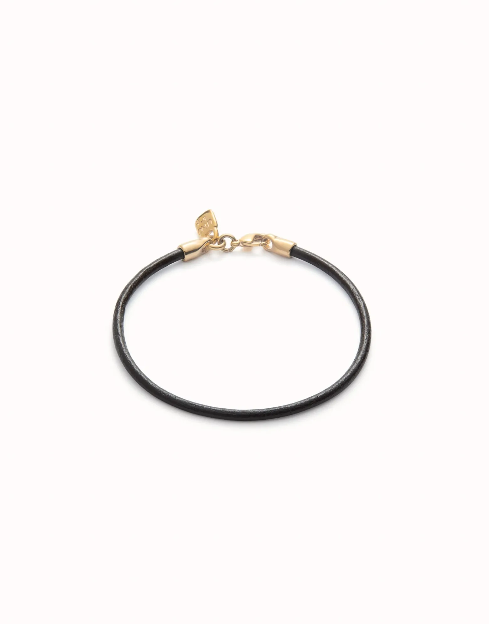 Pulsera de cuero cierre bañado en oro de 18k.