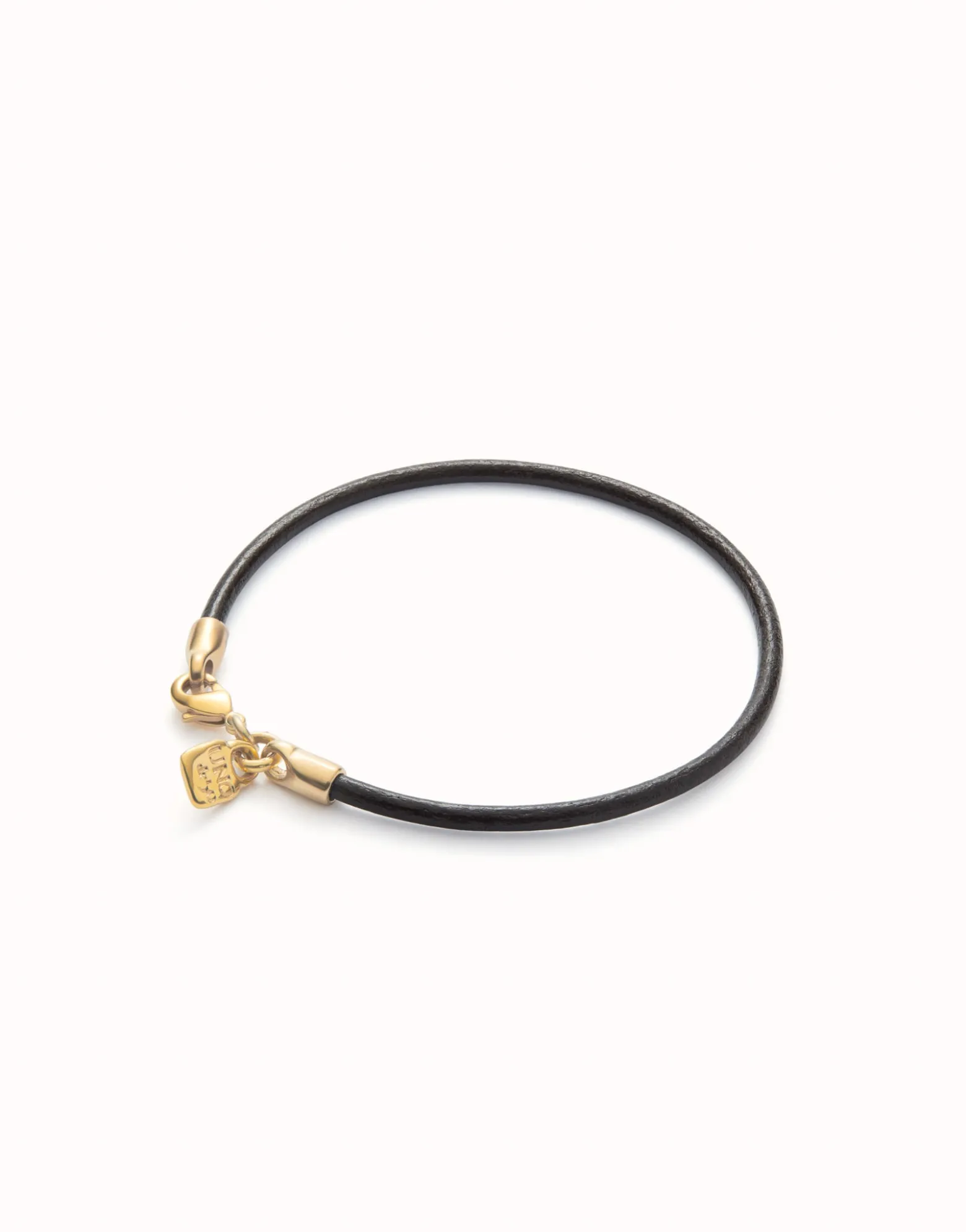 Pulsera de cuero cierre bañado en oro de 18k.