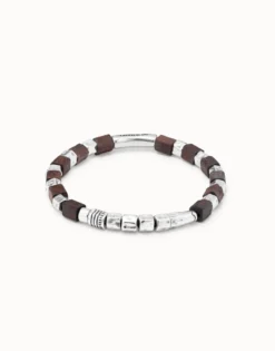 Pulsera de cuero con piezas bañadas en plata de ley y cuentas de madera