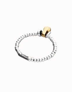Pulsera de esferas en combinación de baño oro y plata