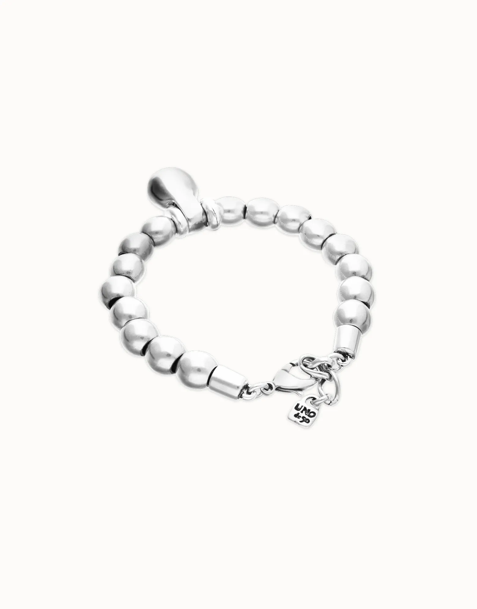 Pulsera de esferas medianas bañadas en plata de ley y esfera grande