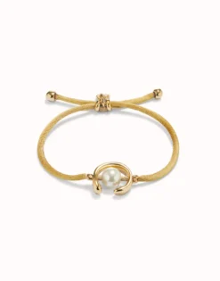 Pulsera de hilo camel con perla shell fornitura bañada en oro 18k.