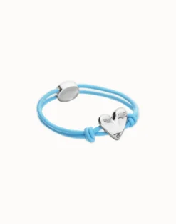 Pulsera de hilo elástico azul con corazón bañado en plata de ley