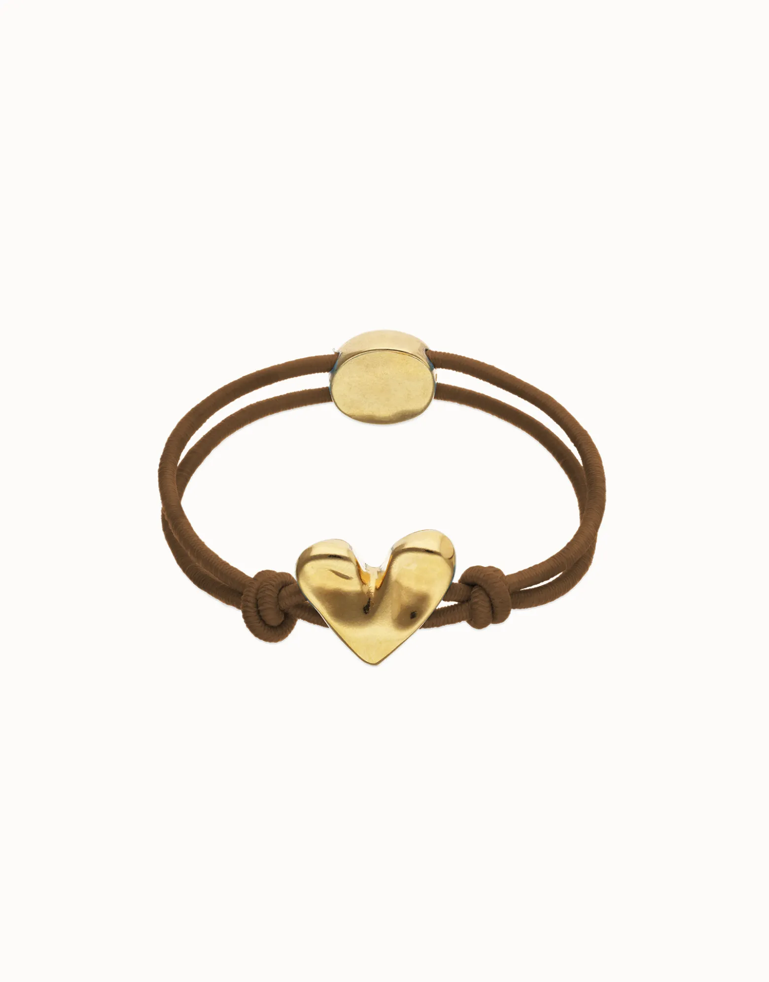 Pulsera de hilo elástico marrón con corazón bañado en oro 18k