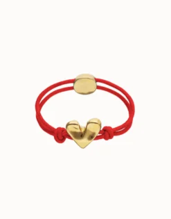 Pulsera de hilo elástico rojo con corazón bañado en oro 18k