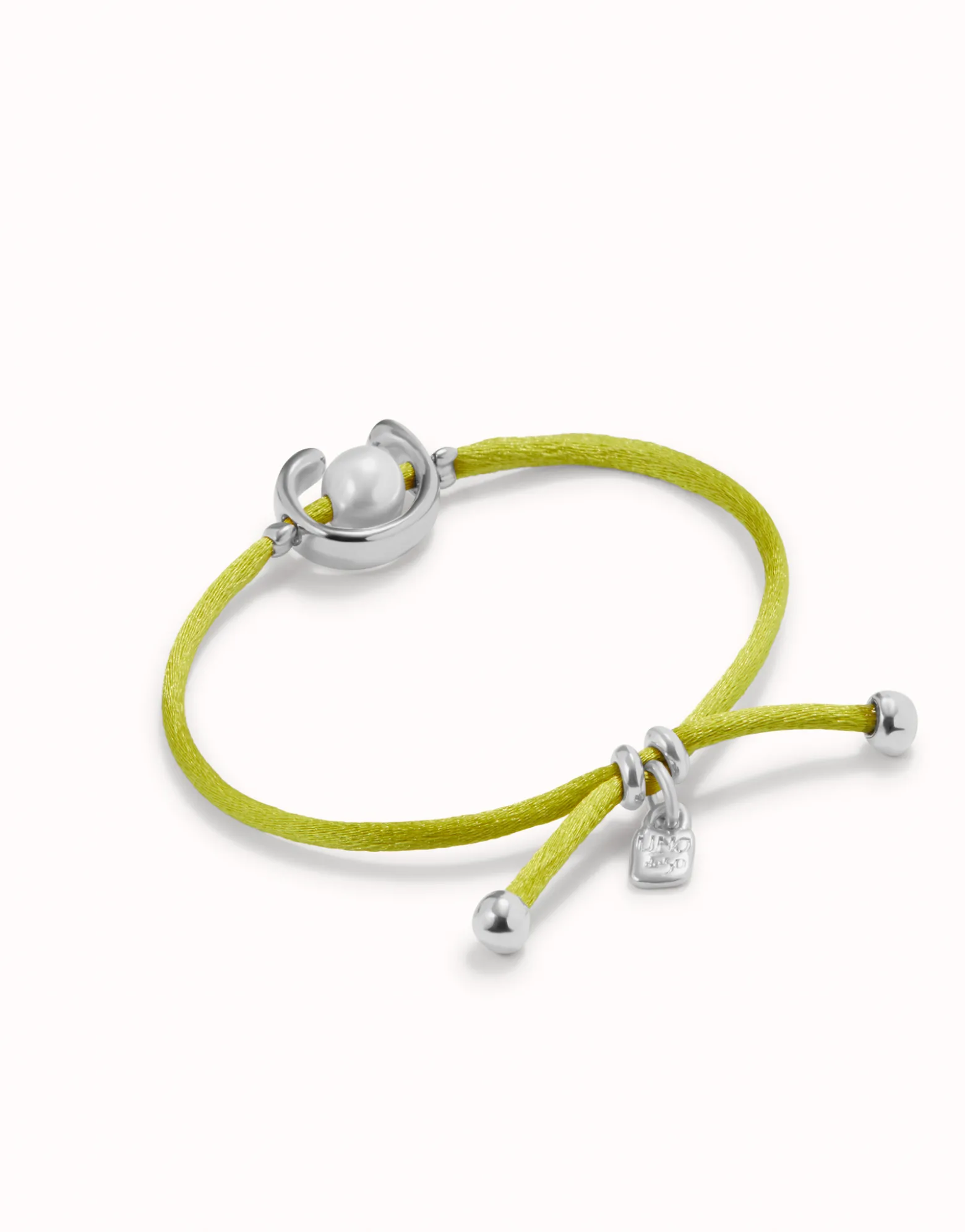 Pulsera de hilo lima con perla shell fornitura bañada en plata de ley.