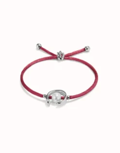 Pulsera de hilo malva con perla shell fornitura bañada en plata de ley.