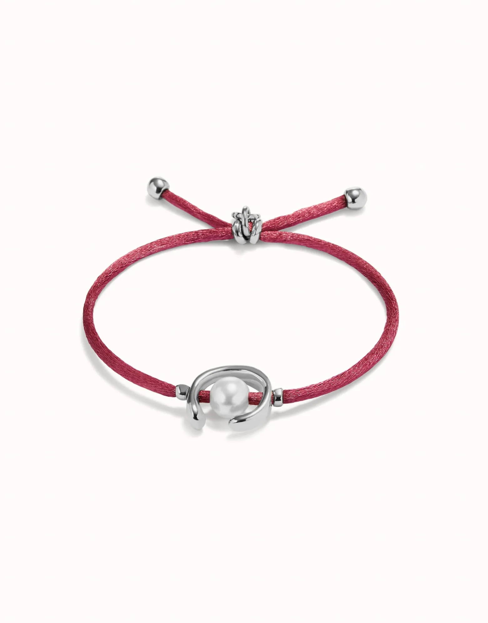 Pulsera de hilo malva con perla shell fornitura bañada en plata de ley.