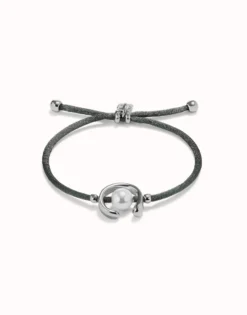 Pulsera de hilo negroso con perla shell fornitura bañada en plata de ley.