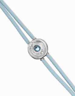 Pulsera doble de cuero celeste con ojo bañado en plata de ley