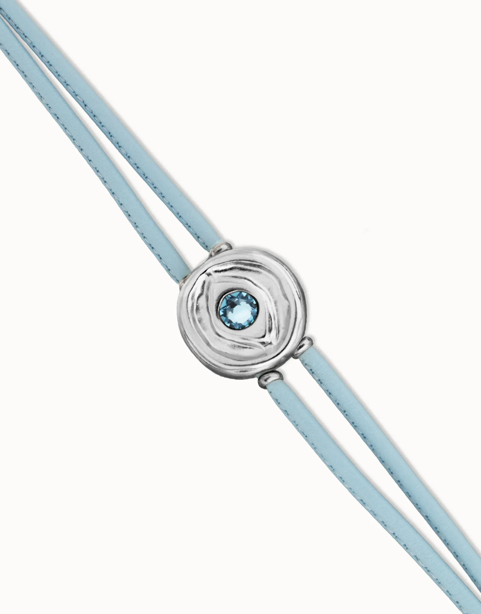 Pulsera doble de cuero celeste con ojo bañado en plata de ley
