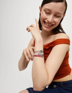 Pulsera doble de cuero lila con ojo bañado en plata de ley