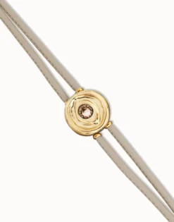 Pulsera doblede cuero marfil con ojo bañado en oro 18k