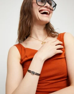 Pulsera doble de cuero negro con ojo bañado en plata de ley