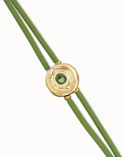 Pulsera doble de cuero verde con ojo bañado en oro 18k