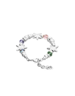 Pulsera elástica bañada en plata con cristales multicolor y estrellas de mar