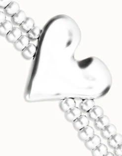 Pulsera elástica doble bañada en plata de ley con detalle de corazón