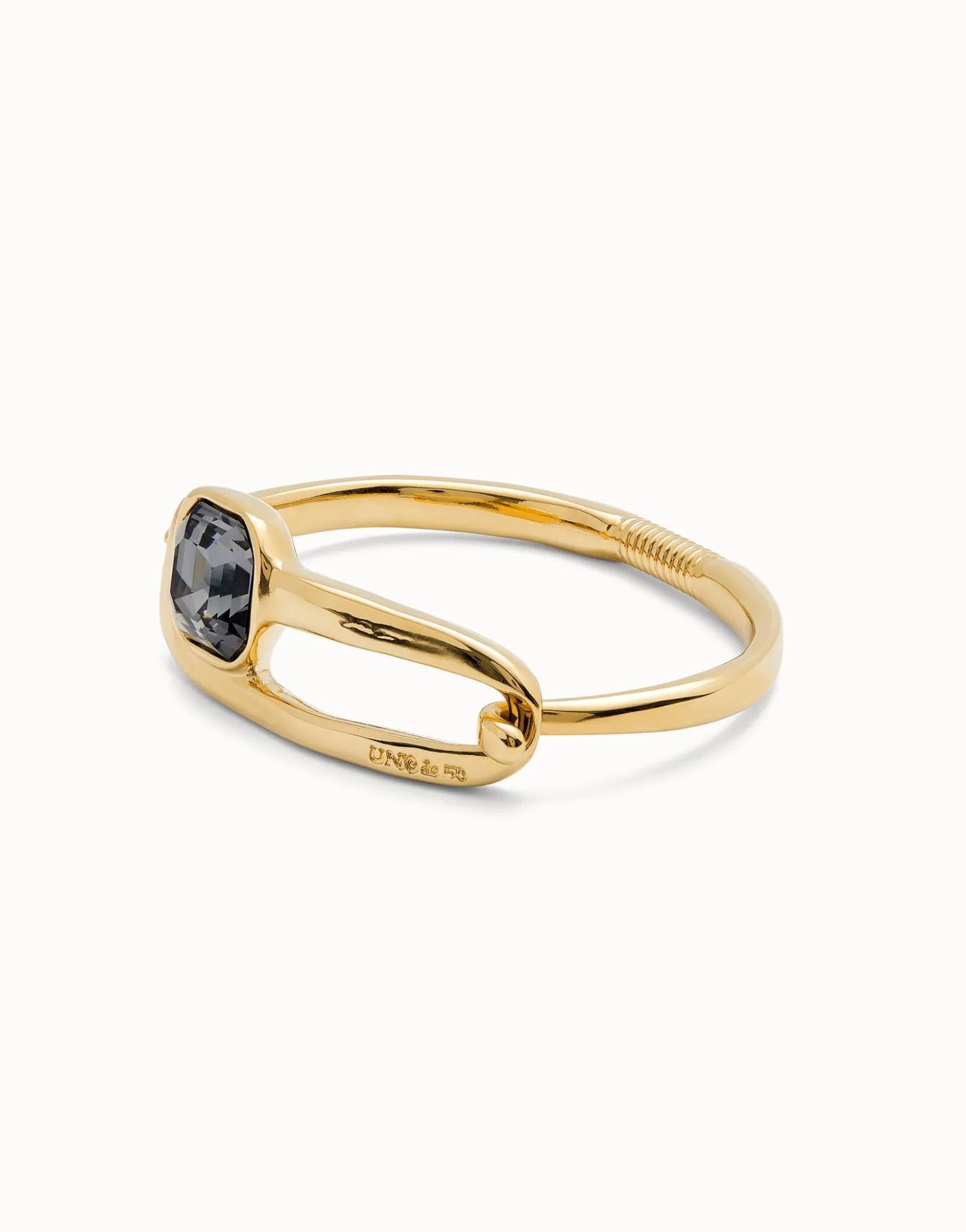 Pulsera rígida bañada en oro 18k con cristal facetado negro