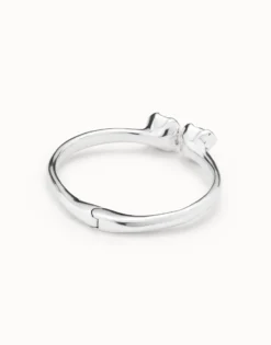 Pulsera rígida bañada en plata de ley, con muelle interior y dos cristales azules