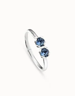 Pulsera rígida bañada en plata de ley, con muelle interior y dos cristales azules